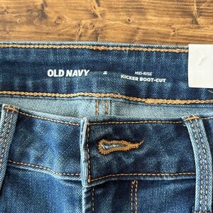 Old Navy Mid-Rise Kicker Boot-Cut Jeans 
Size 2